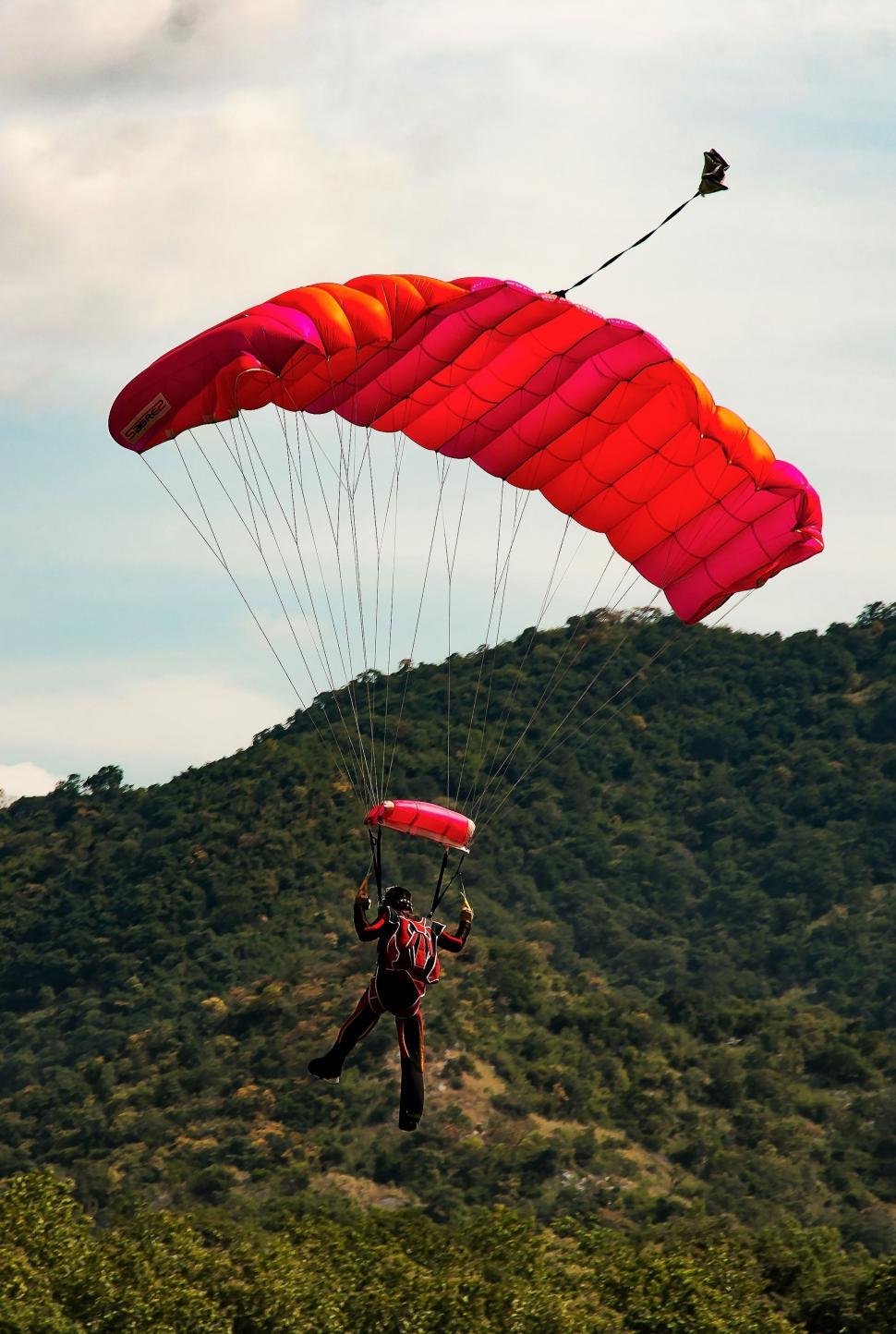 Free Image of Paraglider and Green Mountains  