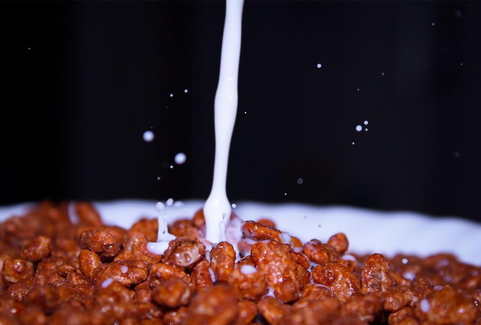 Free Image of Pouring Milk into Cereals  