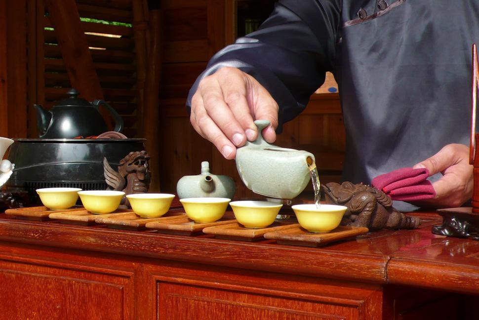 Free Image of Pouring Tea into tea bowl  