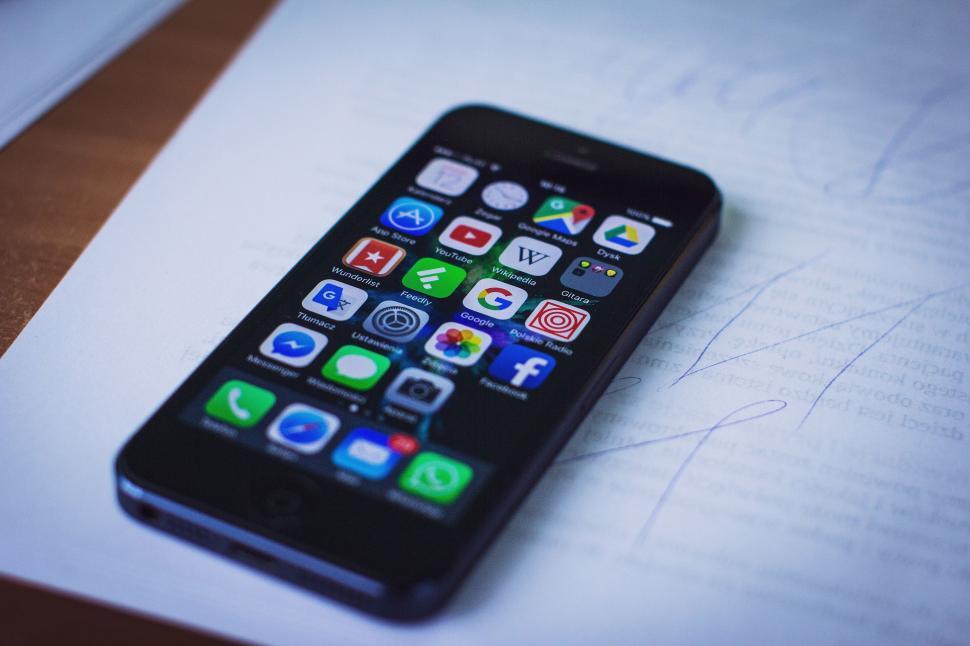 Download Free Stock Photo of iPhone on table  