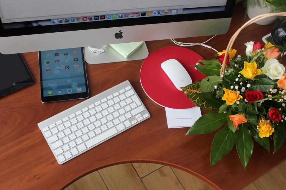 Free Image of Office Table with Flower Bouquet 