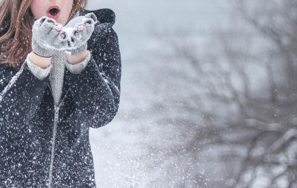 Free Image of Girl Playing With Snow  