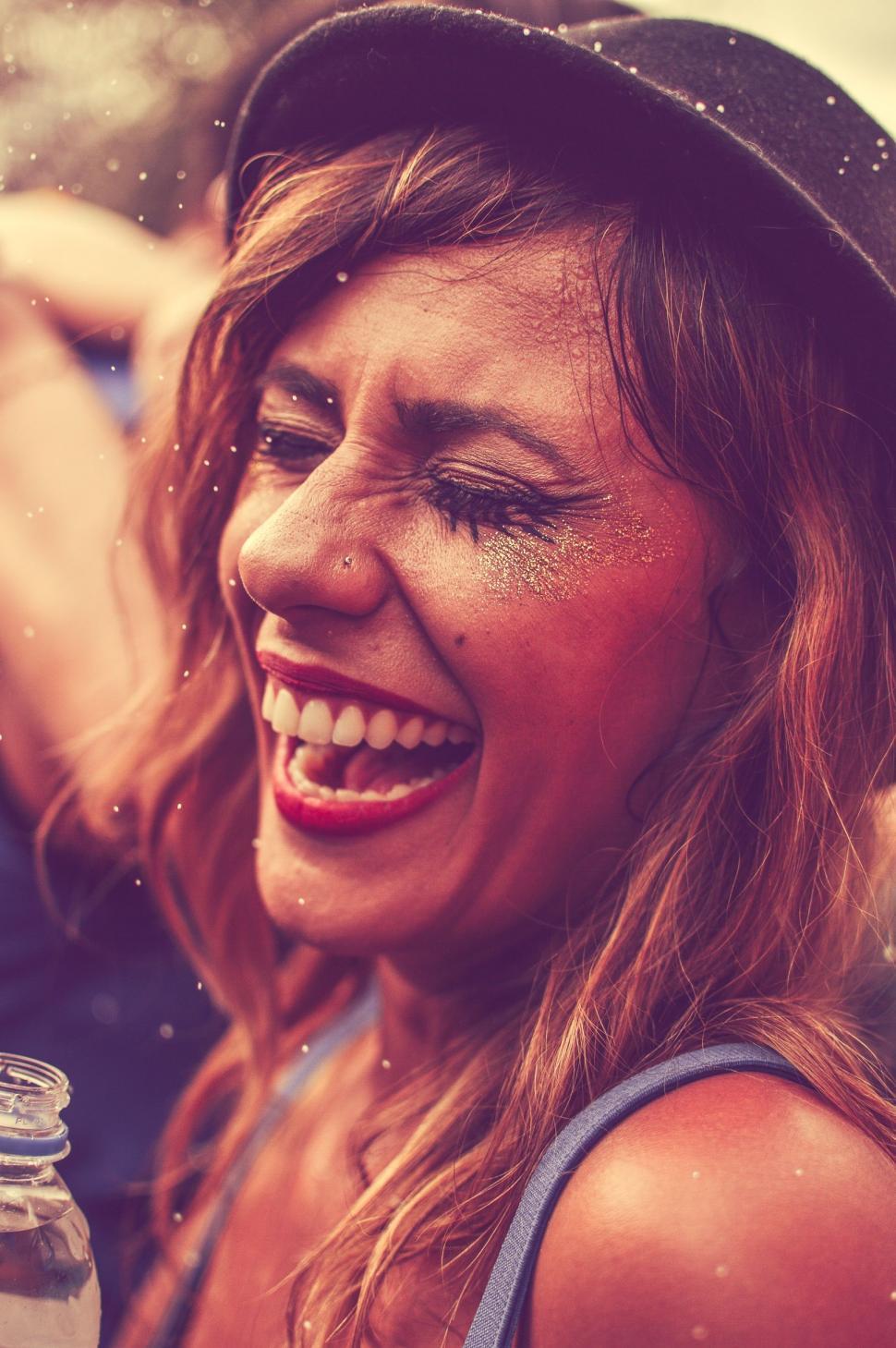 Free Image of Toothy Smile of Woman During a Carnival  