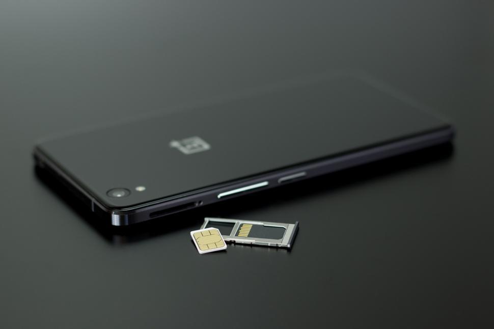 Free Image of OnePlus Phone and sim card  