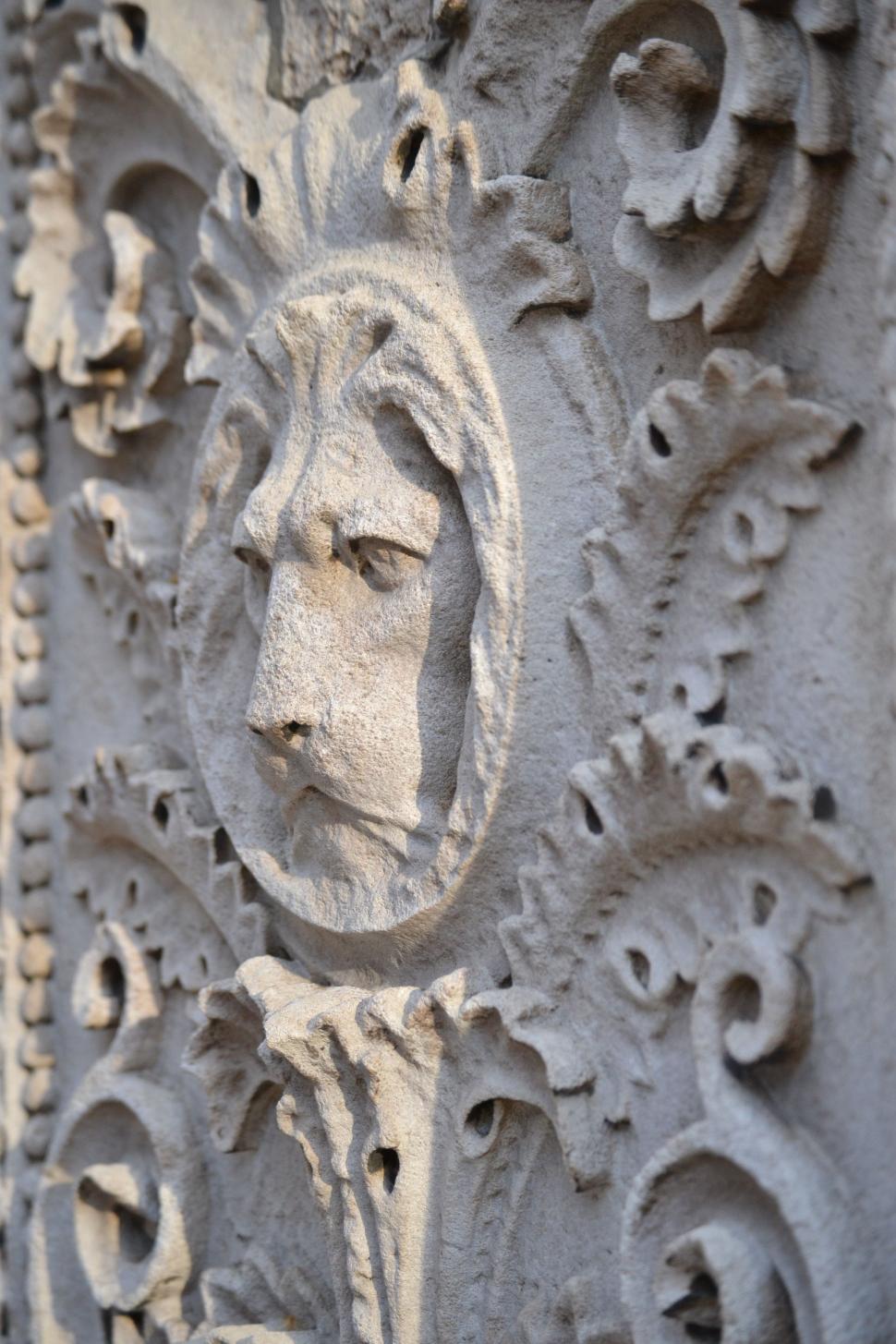 Free Image of Lion head stone wall 