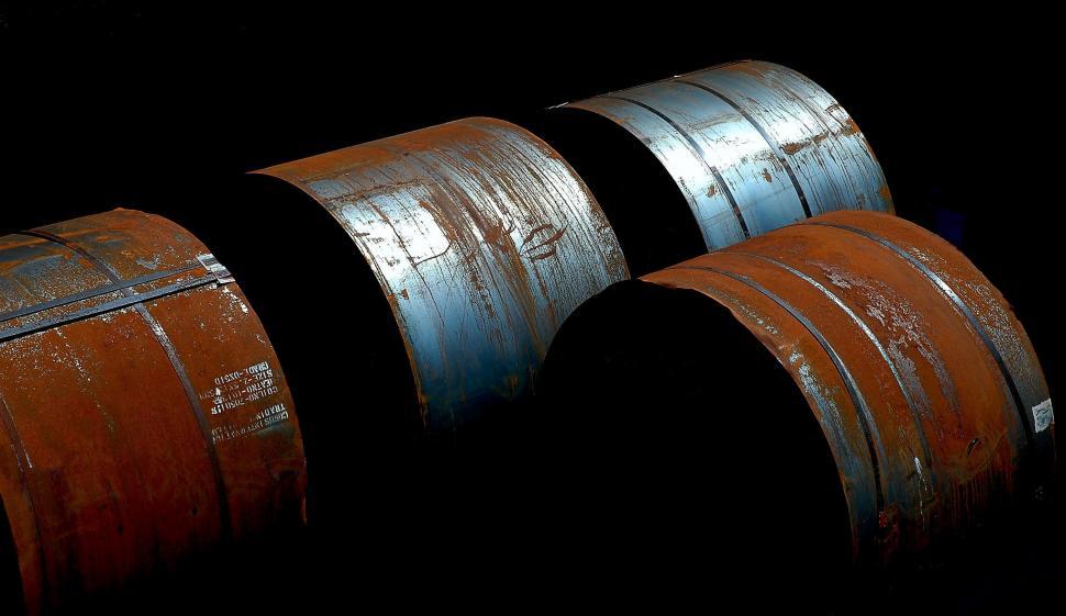 Free Image of Three Rusted Barrels  
