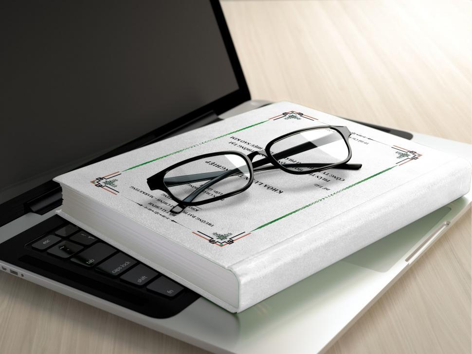 Free Image of Spectacles, Book and Laptop  