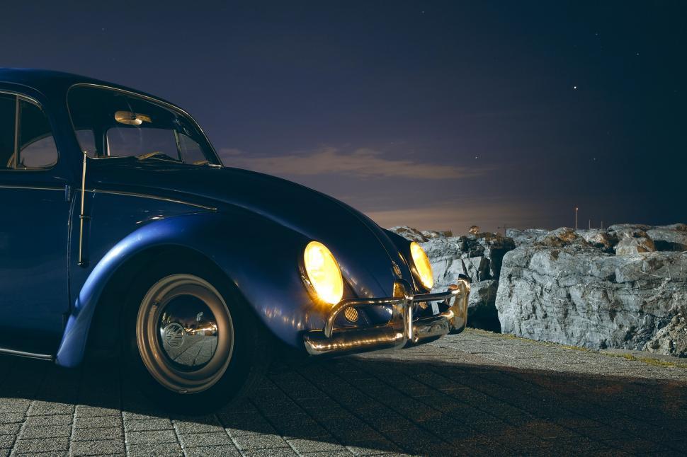 Free Image of Night View of Headlights of Beetle Car  