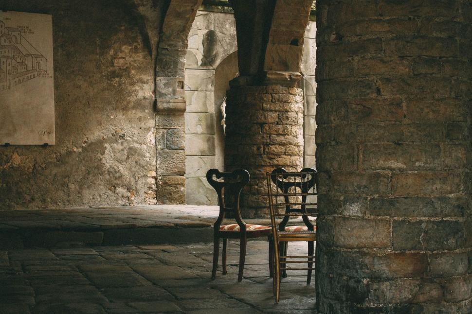 Free Image of Chairs inside old Castle  