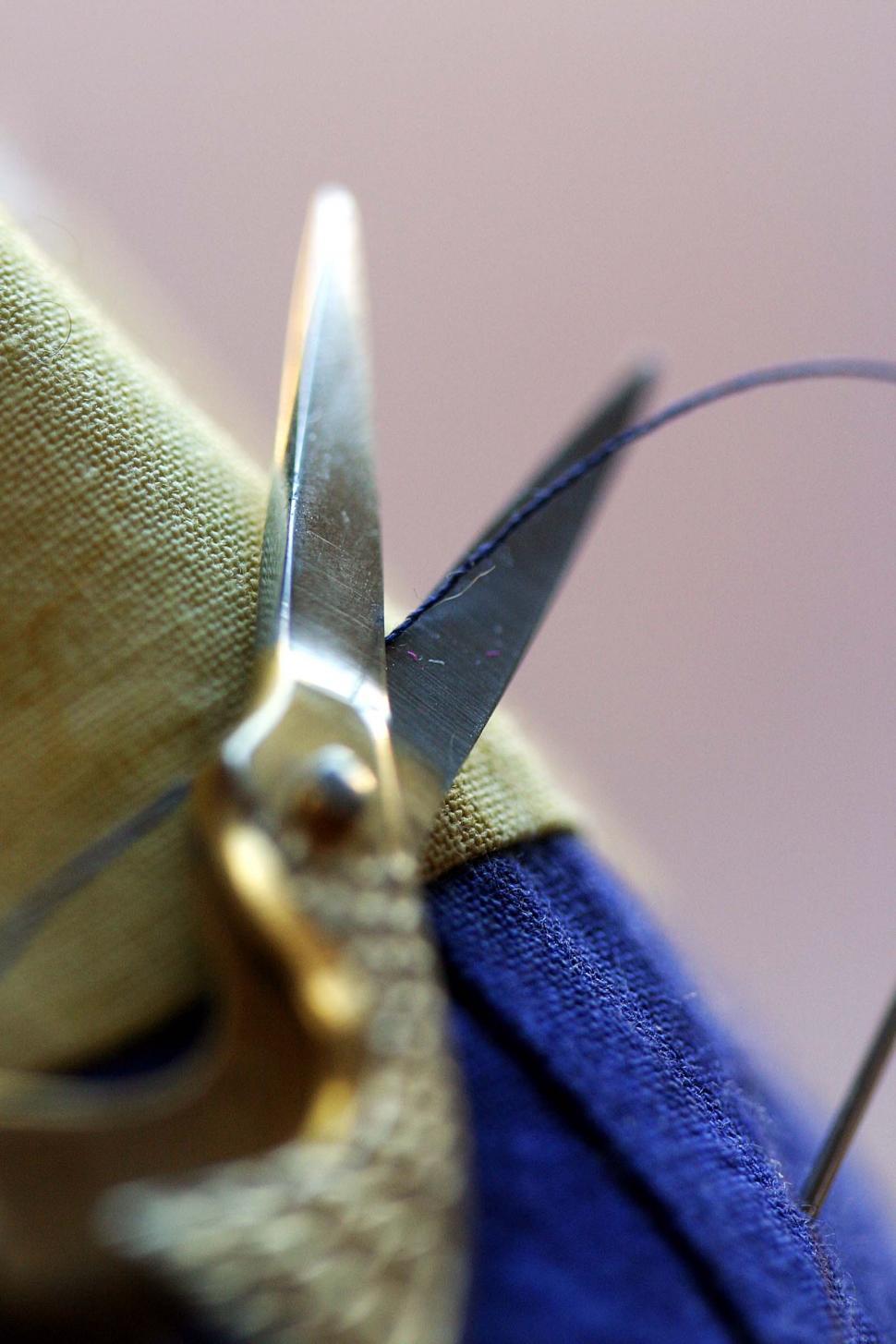 Free Image of sewing needles threads fabric stitching quilting scissors blades cut snip trim crane 