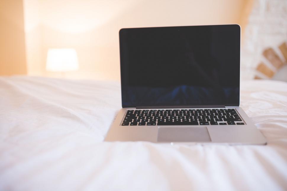 Free Image of Laptop on Bed  