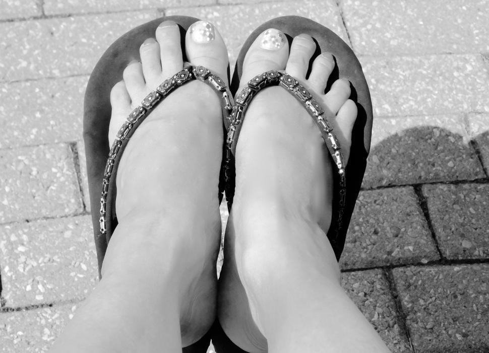 Free Image of Flip Flop Slippers and Feet 