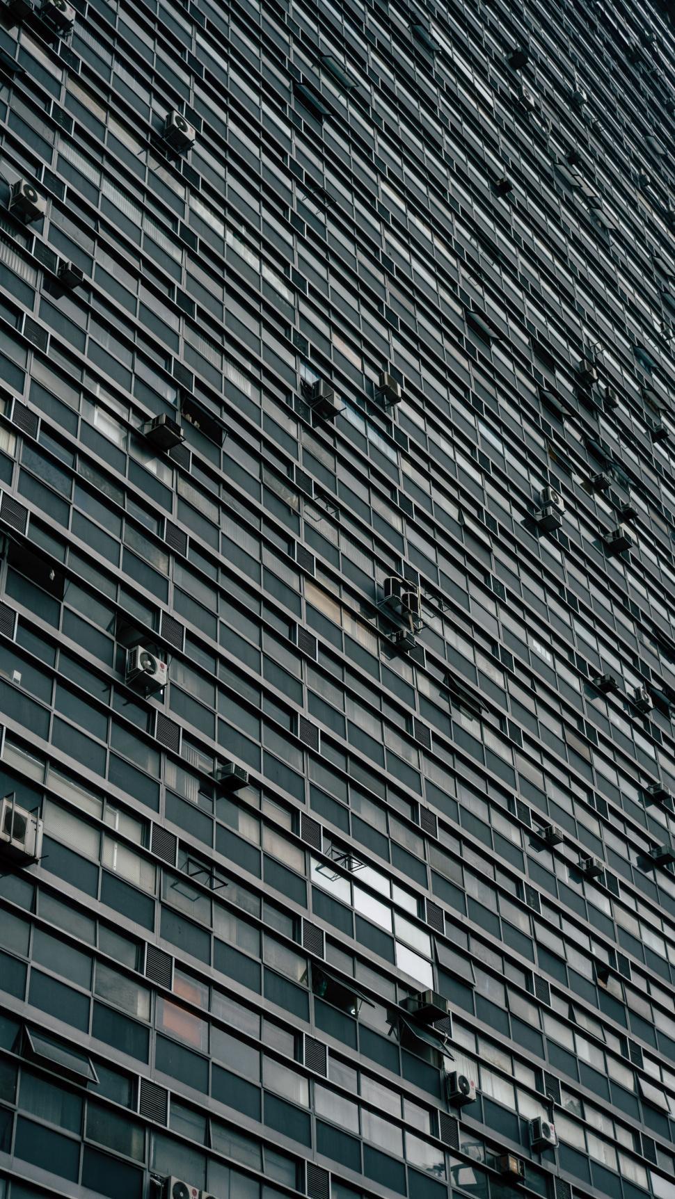 Free Image of Vertical View of building windows  