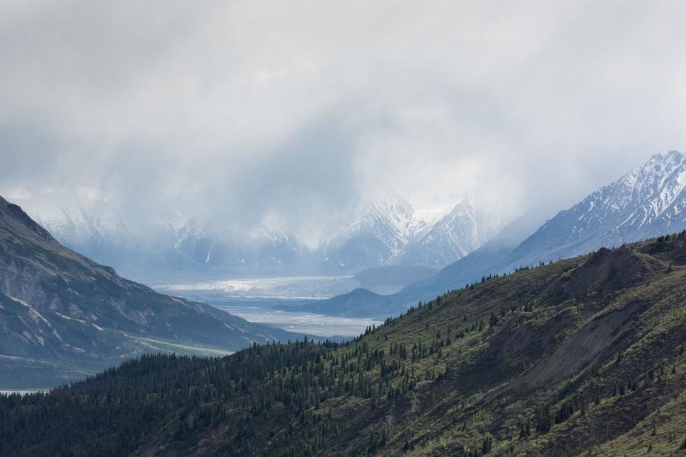 Free Image of Green Mountains, Fog and Snow Mountains  