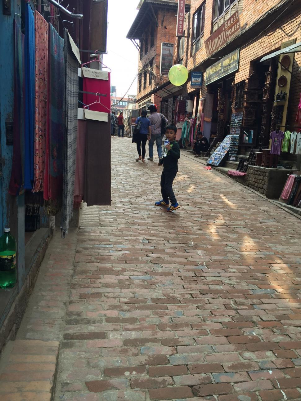 Free Image of Child in Market 