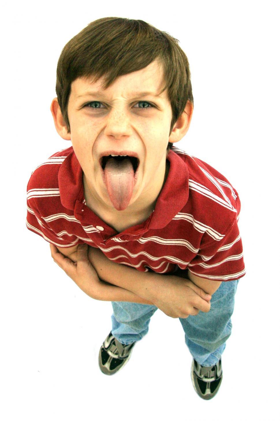Free Image of Kid sticking out tongue 
