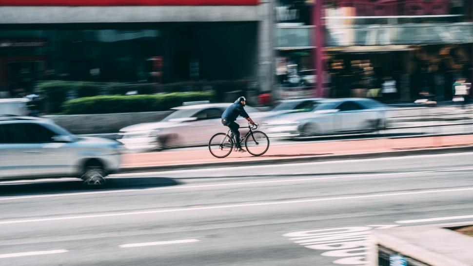 Free Image of Cyclist on Street - Speed Effect  