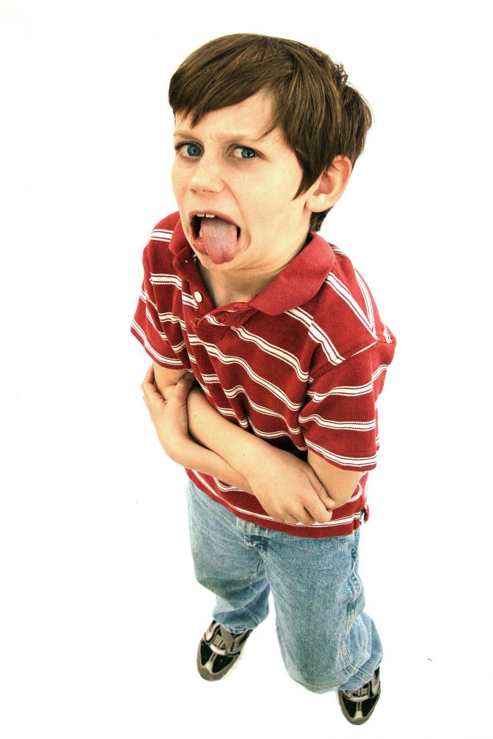 Download Free Stock Photo of Boy with goofy disgusted look and arms crossed 