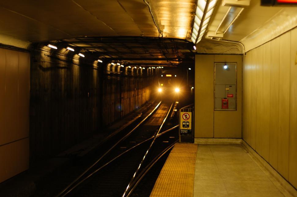 Free Image of Subway station with train running 