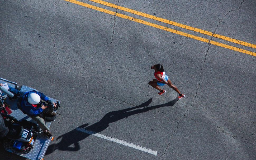Free Image of Woman Athlete Running on Marathon  