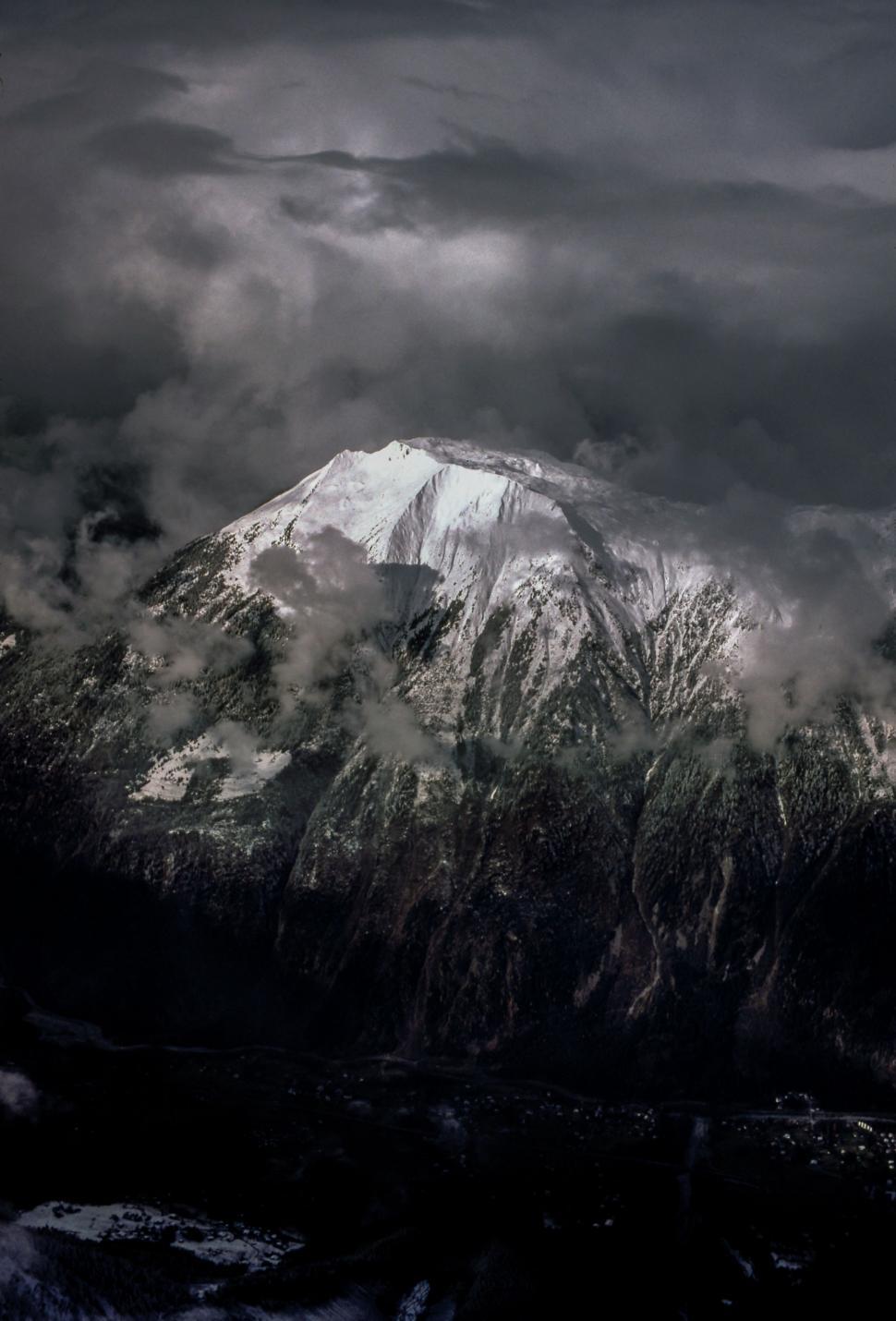 Free Image of Snow Mountains with Dark Clouds  