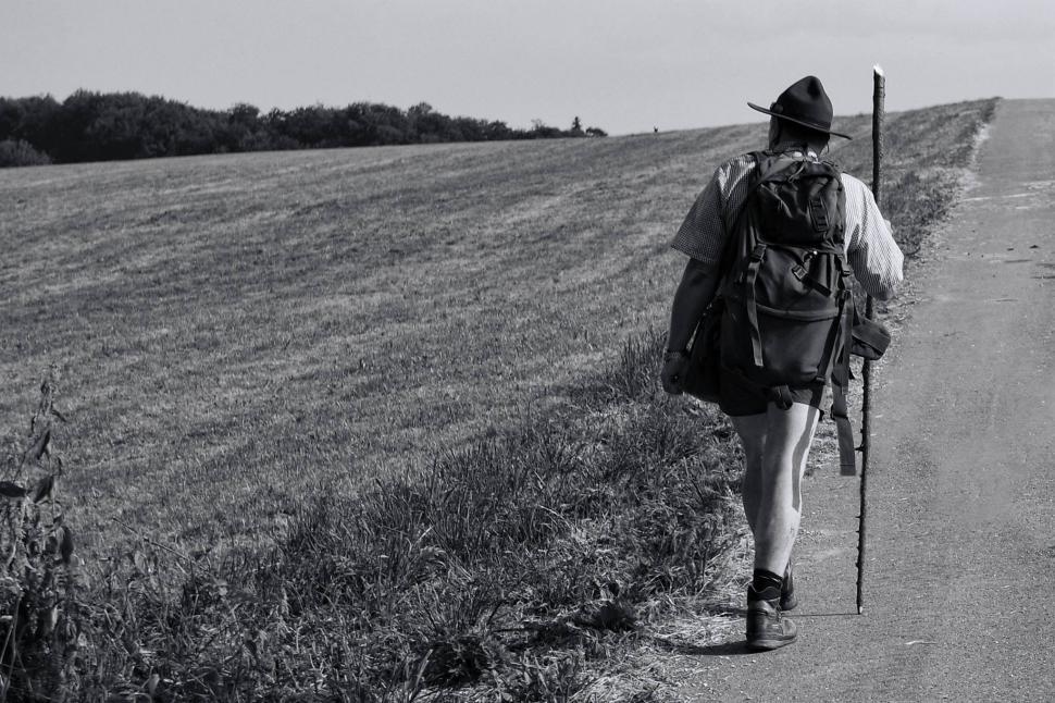 Free Image of Male Hiker in hat on Farmland  