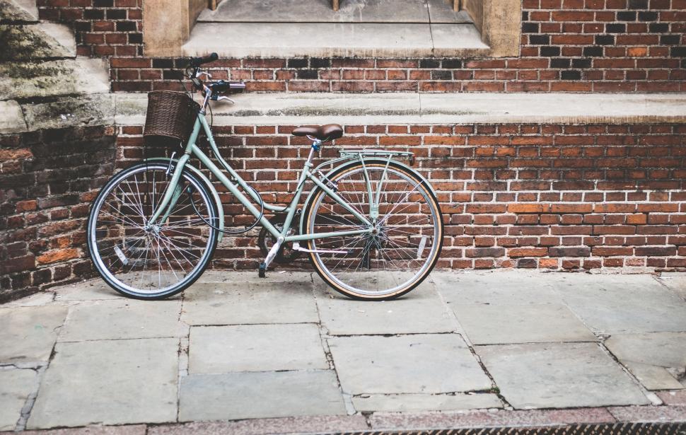 Free Image of Bicycle and brick wall  