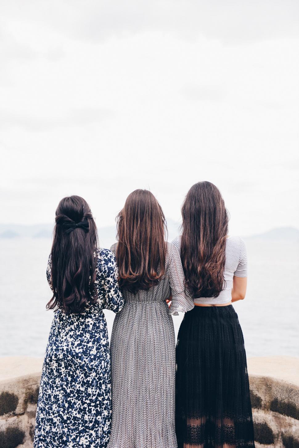 Free Image of Three Young Women With Long Hair  