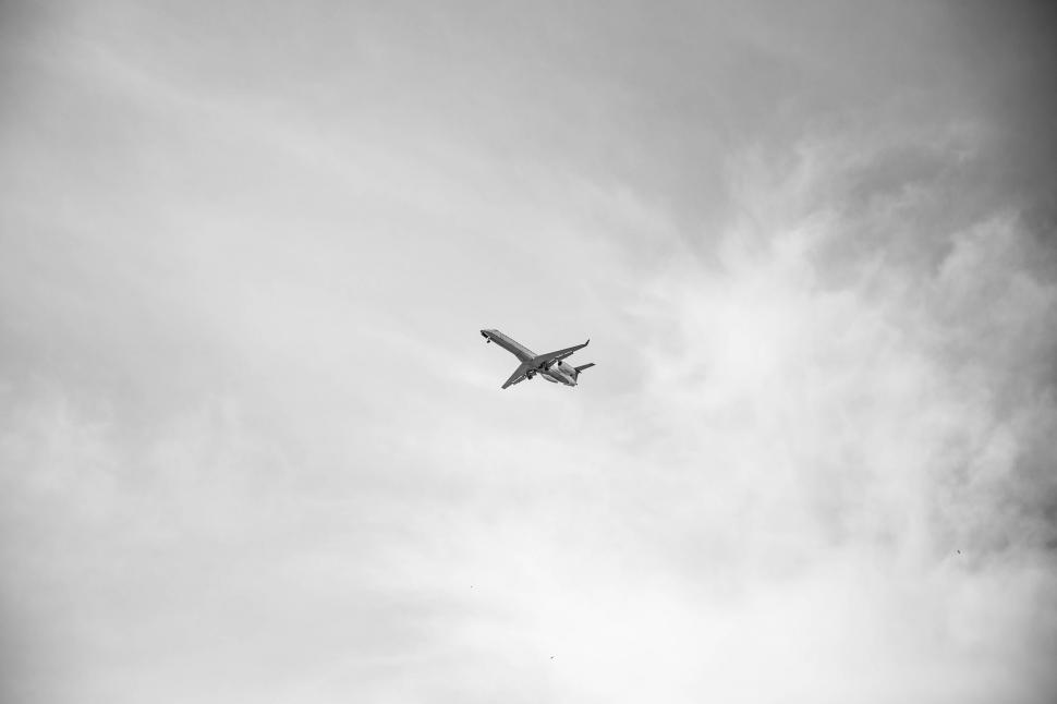 Free Image of Aircraft in Clouds - Monochrome  