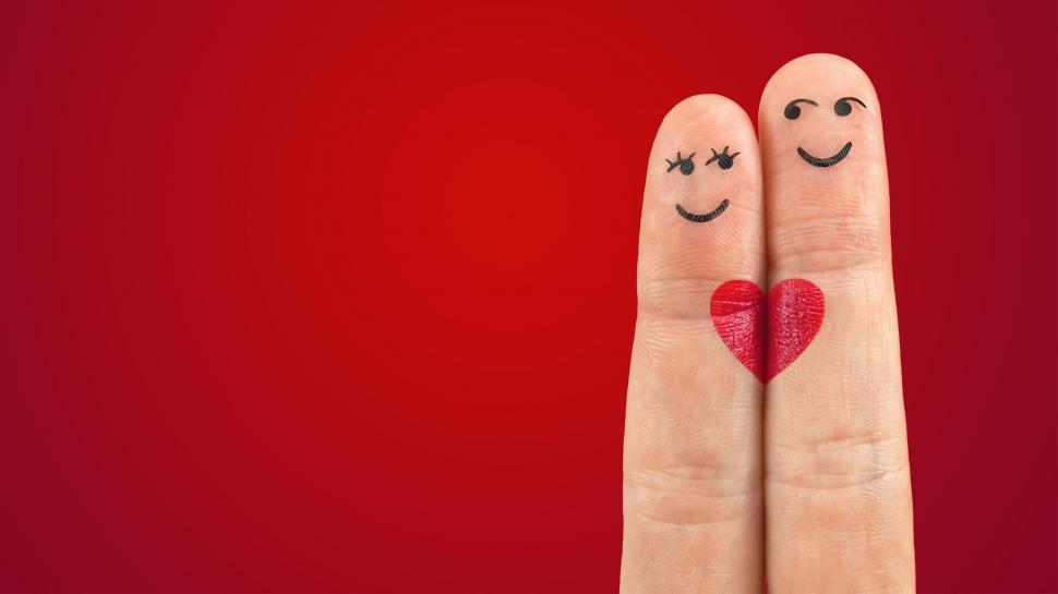 Free Image of Happy couple in love with painted smiley 