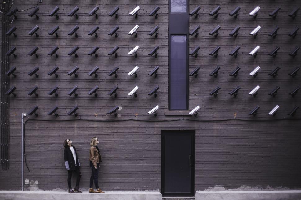 Free Image of Women and CCTV Cameras  