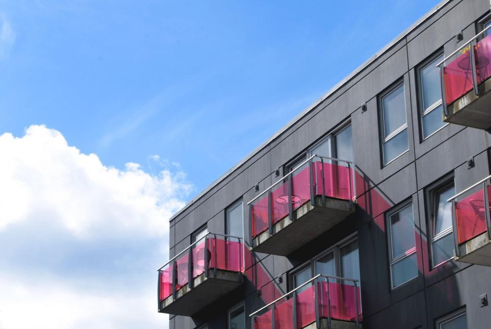 Free Image of Pink Glass Balconies  