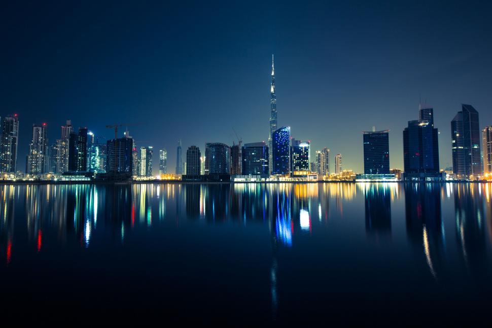 Free Image of Skyscrapers at night with Reflections  