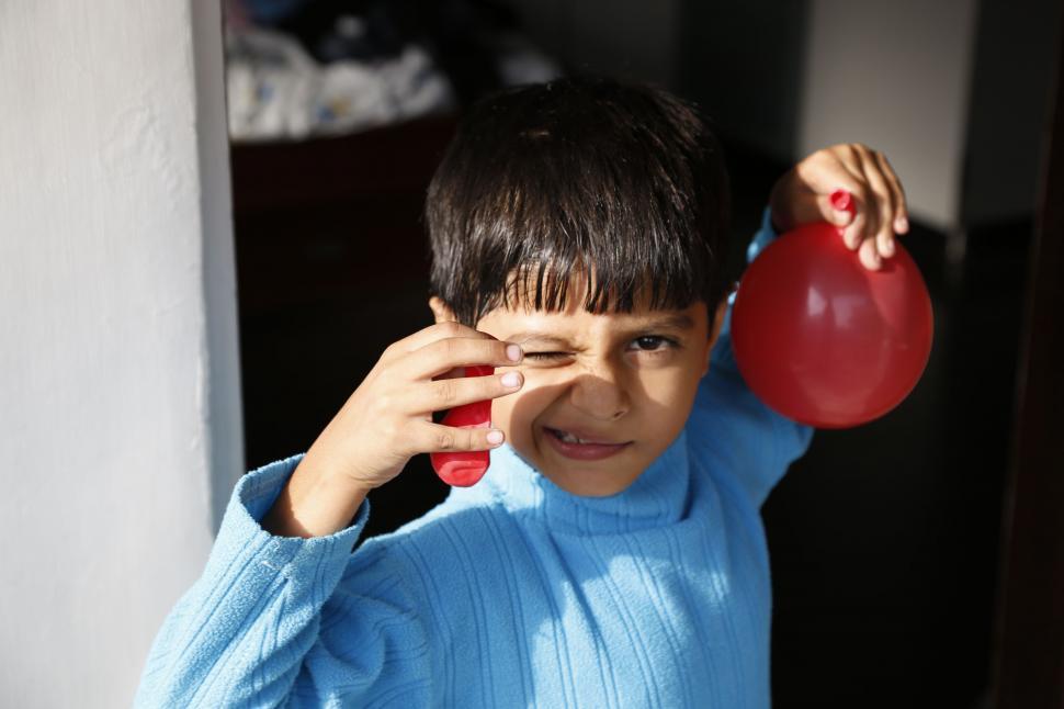 Free Image of Boy with Balloons  