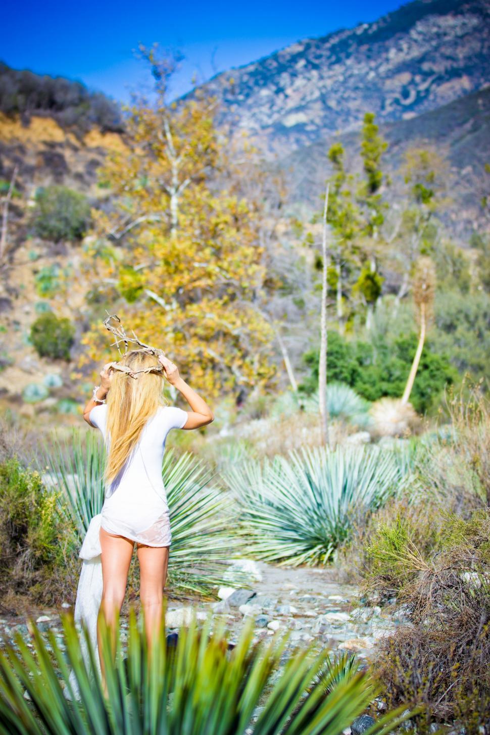 Free Image of Blonde Woman Standing in Forest  
