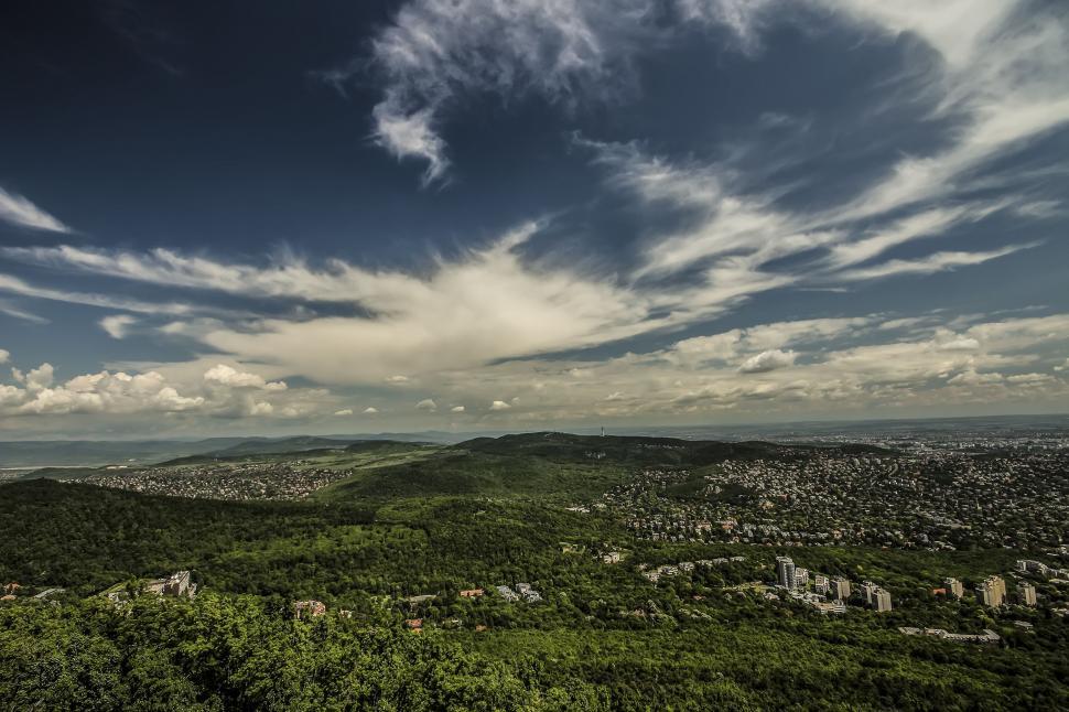 Free Image of Green Mountains and City 