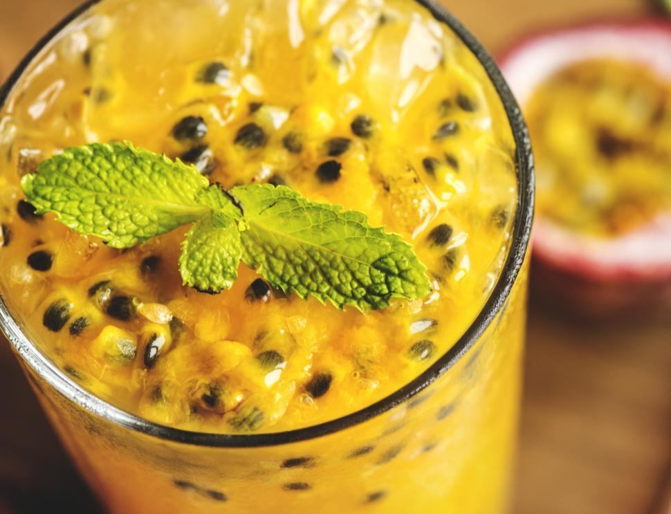 Free Image of Close up of a glass of rich passion fruit smoothie 