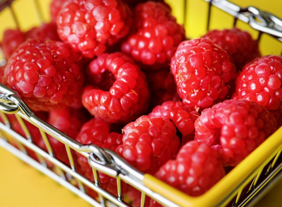 Free Image of Close up of bin full of fresh raspberries 