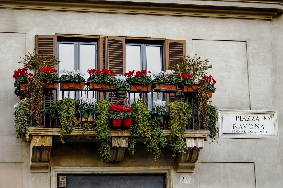 Free Image of Balcony decorated with Flowers  