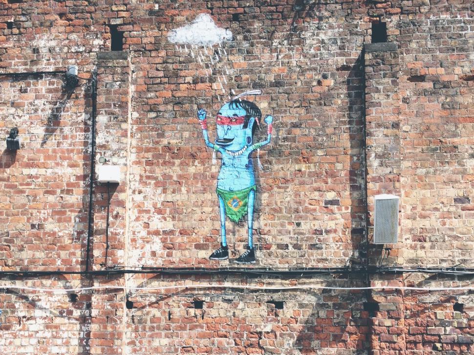 Free Image of Graffiti on Brick Wall 