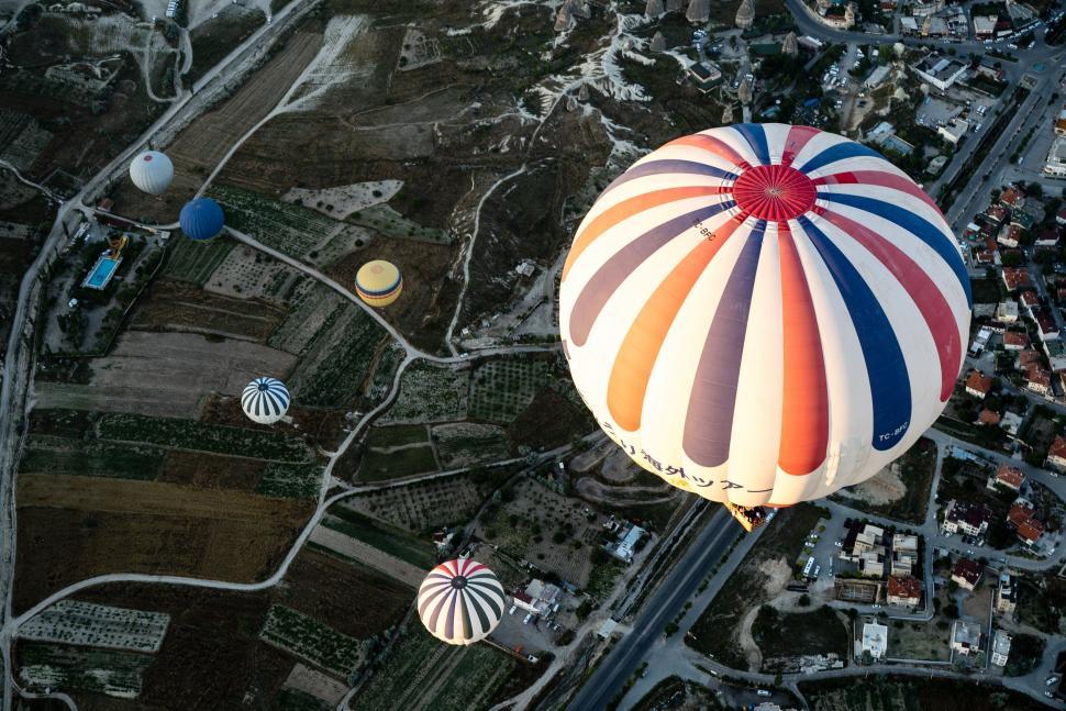 Free Image of Hot Air Balloons Over City  