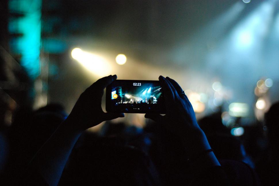 Free Image of Mobile Photography During Live Music  