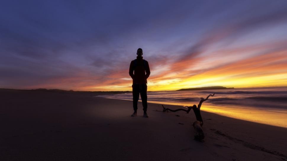 Free Image of Alone Man on Beach During Sunset  