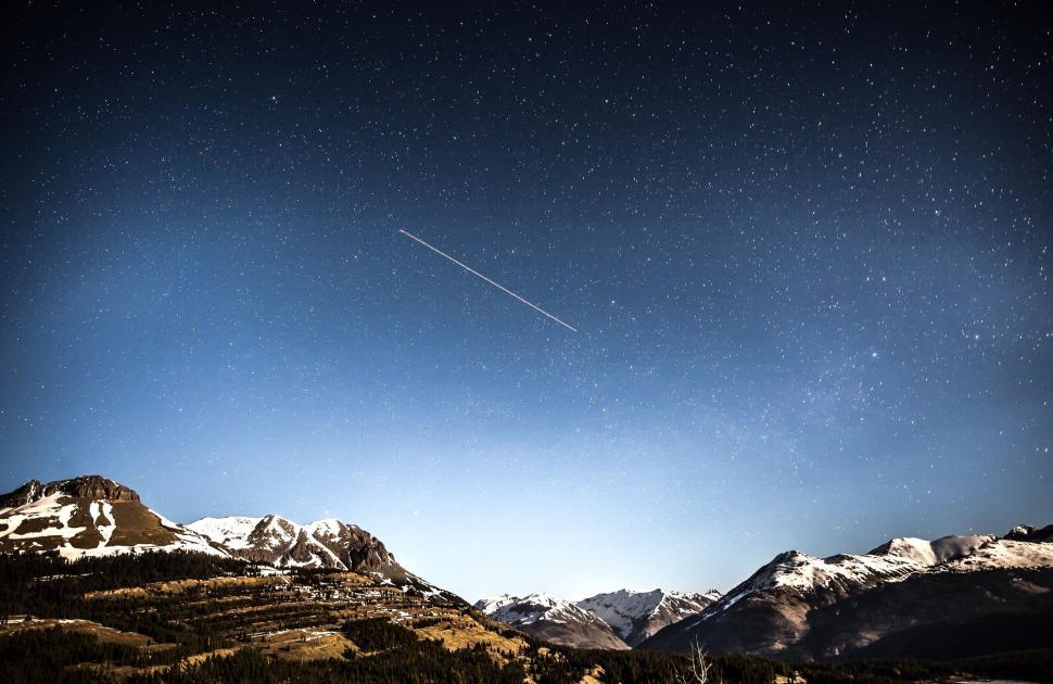Free Image of Shooting Star over Mountains 