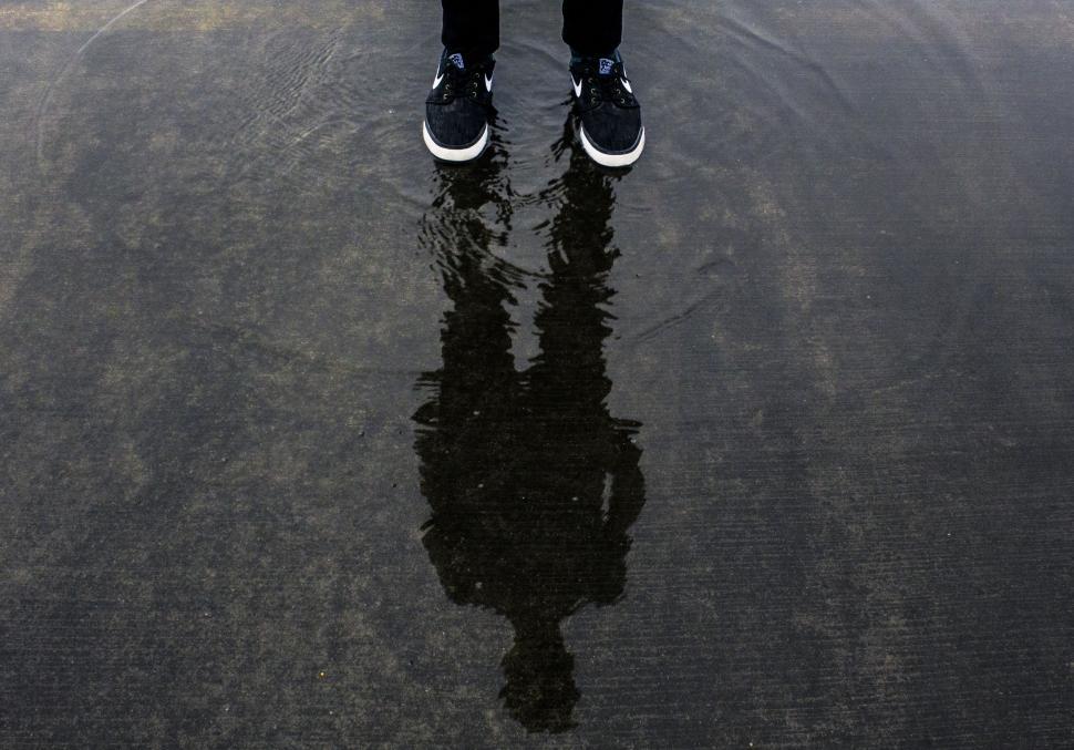 Download Free Stock Photo of Reflection of Man on water 