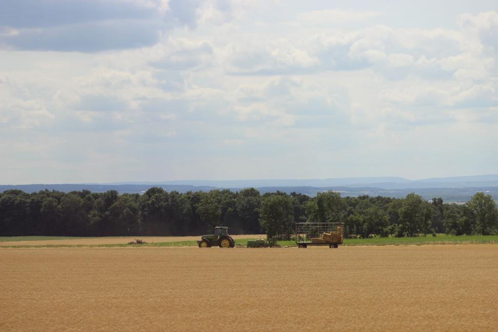 Free Image of Tractor in hay field 