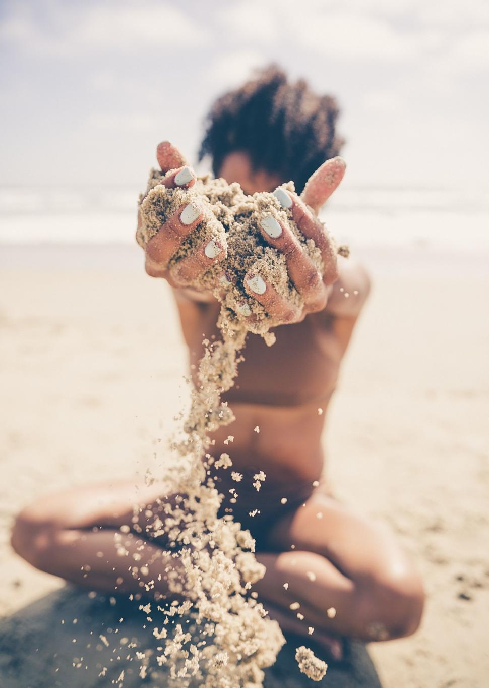 Free Image of Sand in hands  