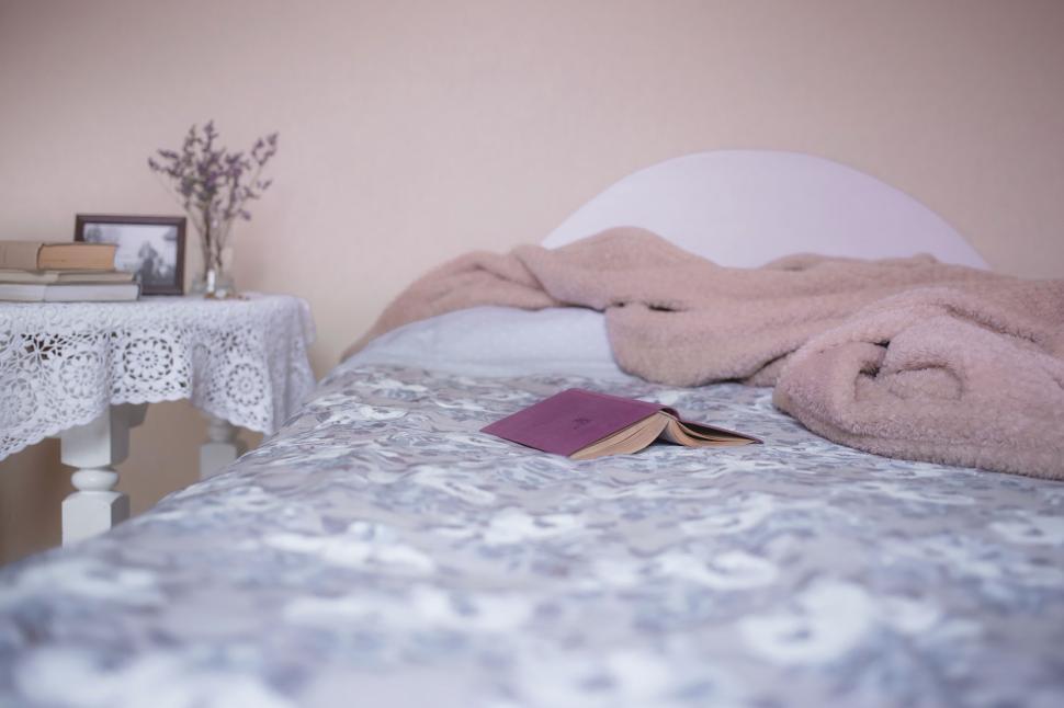 Free Image of Book on Bed  