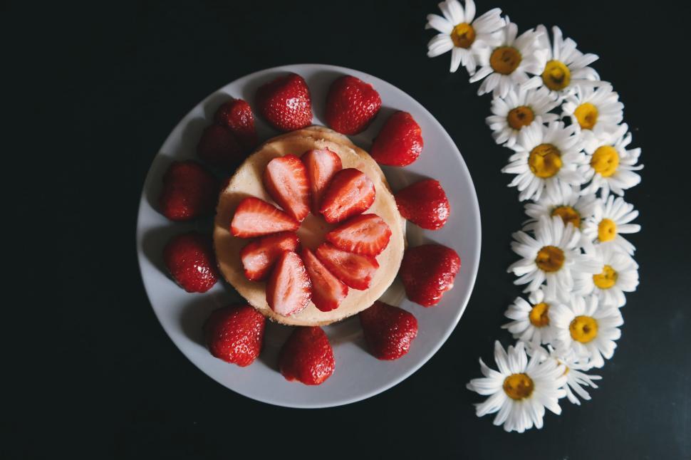 Free Image of Strawberries and White Flowers  