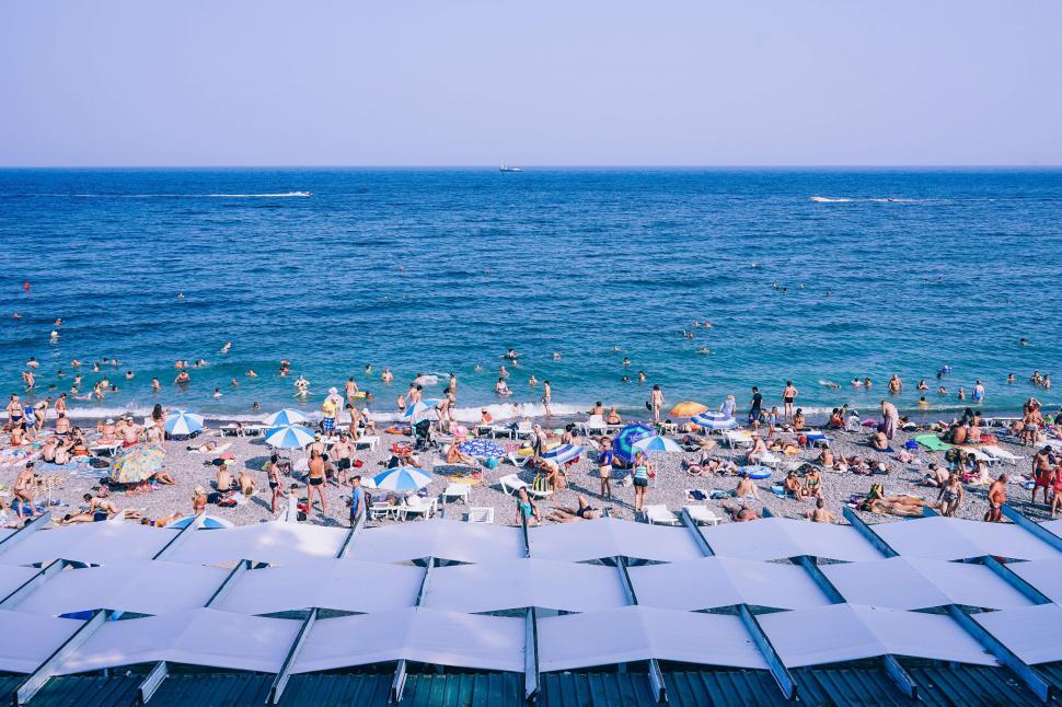 Free Image of People at beach during daytime  
